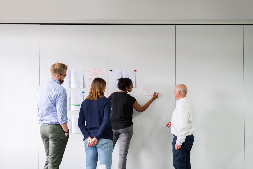 A security team planning test scope on a whiteboard, informed by the OWASP Top 10 categories