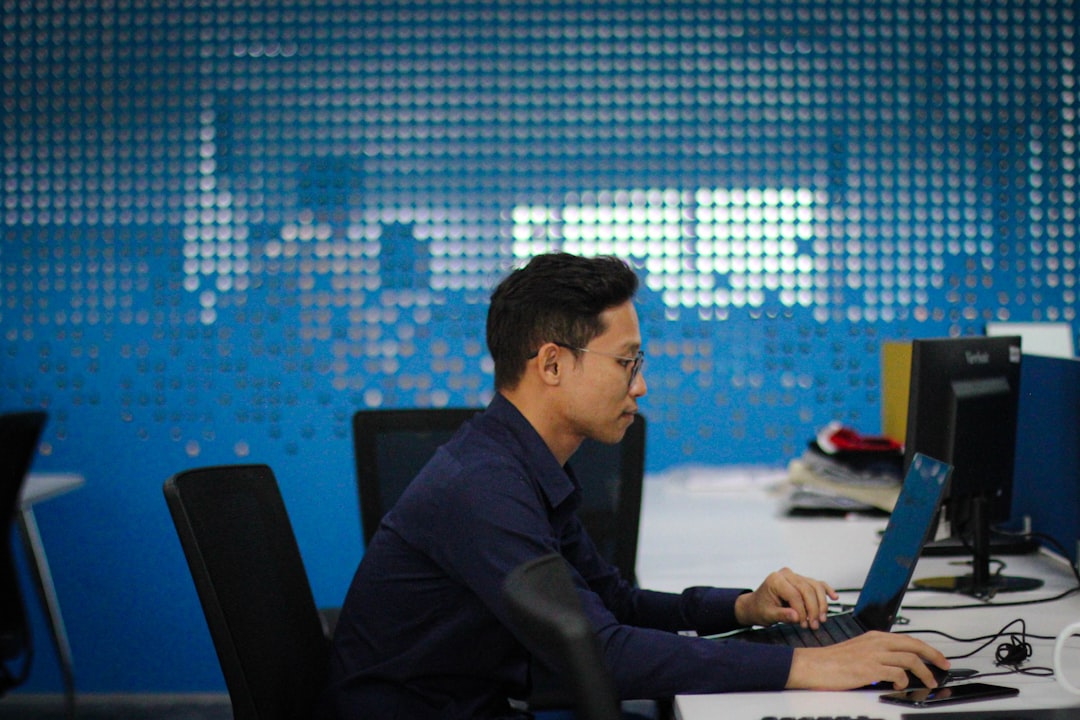 An analyst working at a desk while investigating signs of lateral movement