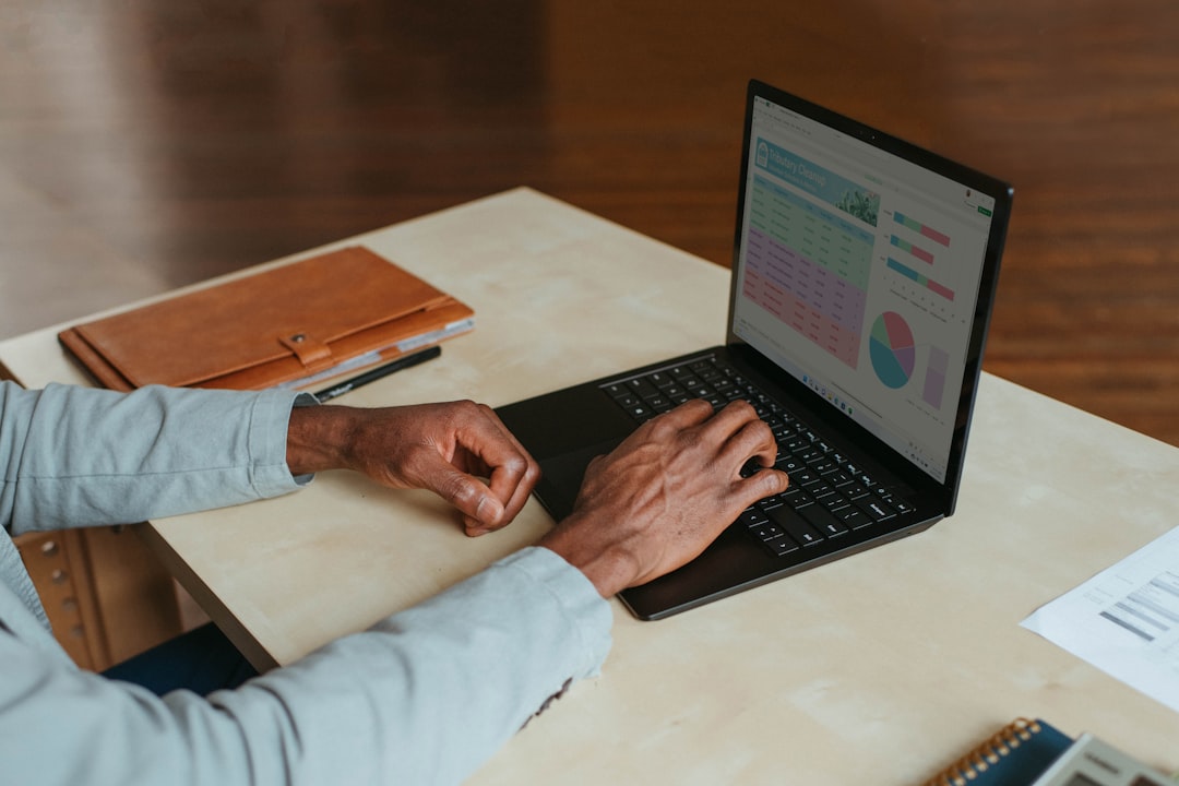 IT manager reviewing a security dashboard while preparing SOC 2 penetration testing requirements evidence