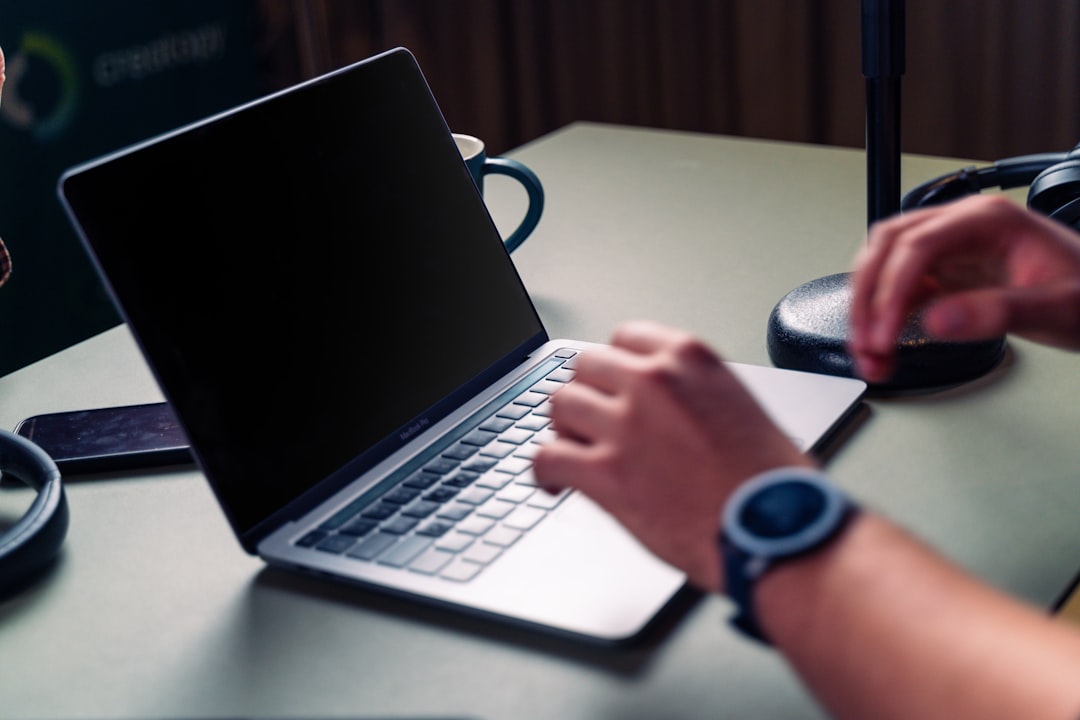 Security consultant working through a penetration testing methodology on a laptop