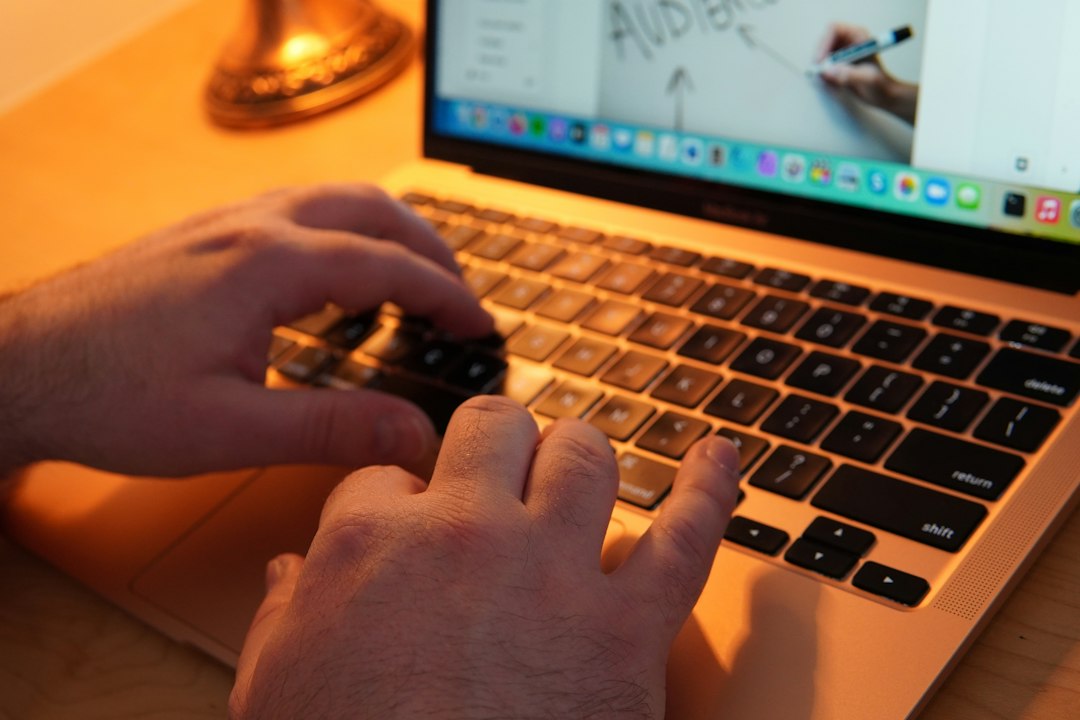 Close-up of a user working in an authenticated web session that session hijacking can take over