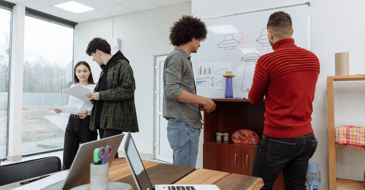 Engineers and product staff reviewing plans before penetration testing for SaaS scoping