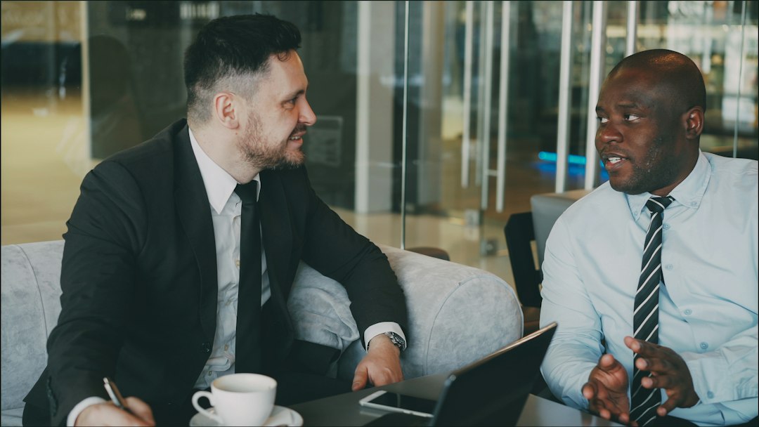 Two business people discussing whether to commission a penetration test